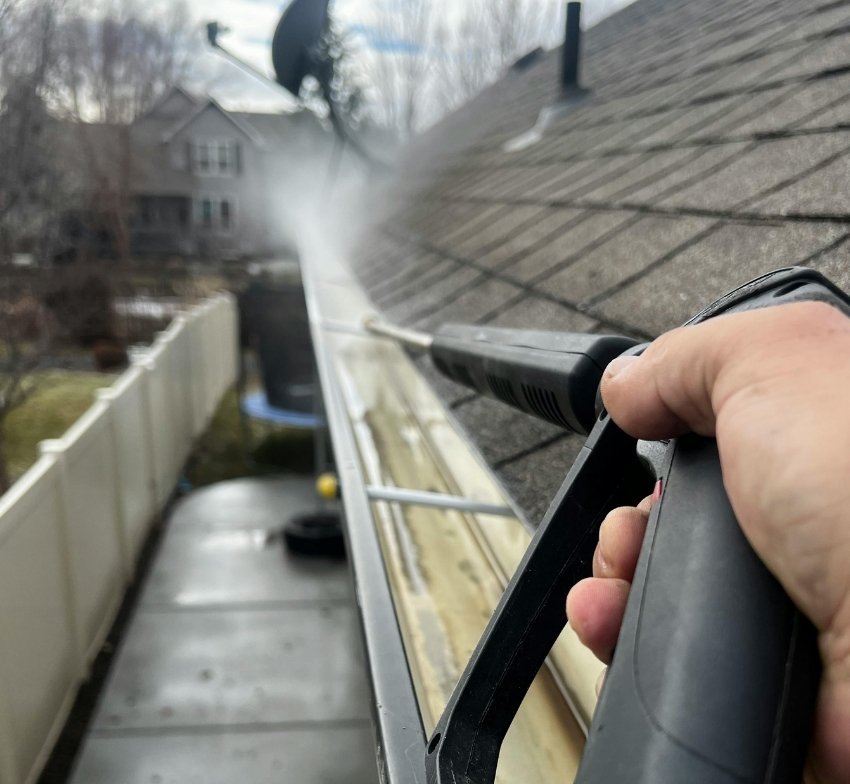 Soft Washing, Hand Scraping and Biocidal Application: Matching the Method to the Roofing Material
